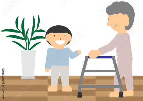孫と室内用固定型歩行器で歩く高齢者