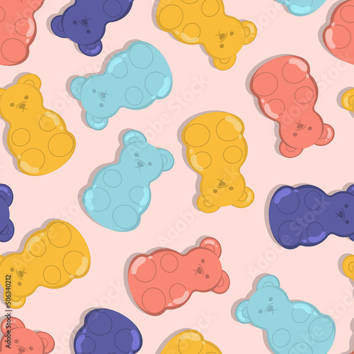 Pattern of jelly gummy bears on pink background.