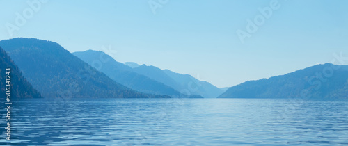 Panoramic view at mountains and lake. Altai Republic, Lake Teletskoye.