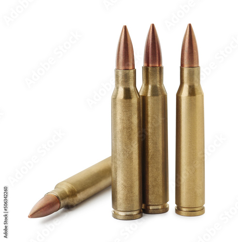 Many bullets on white background. Military ammunition