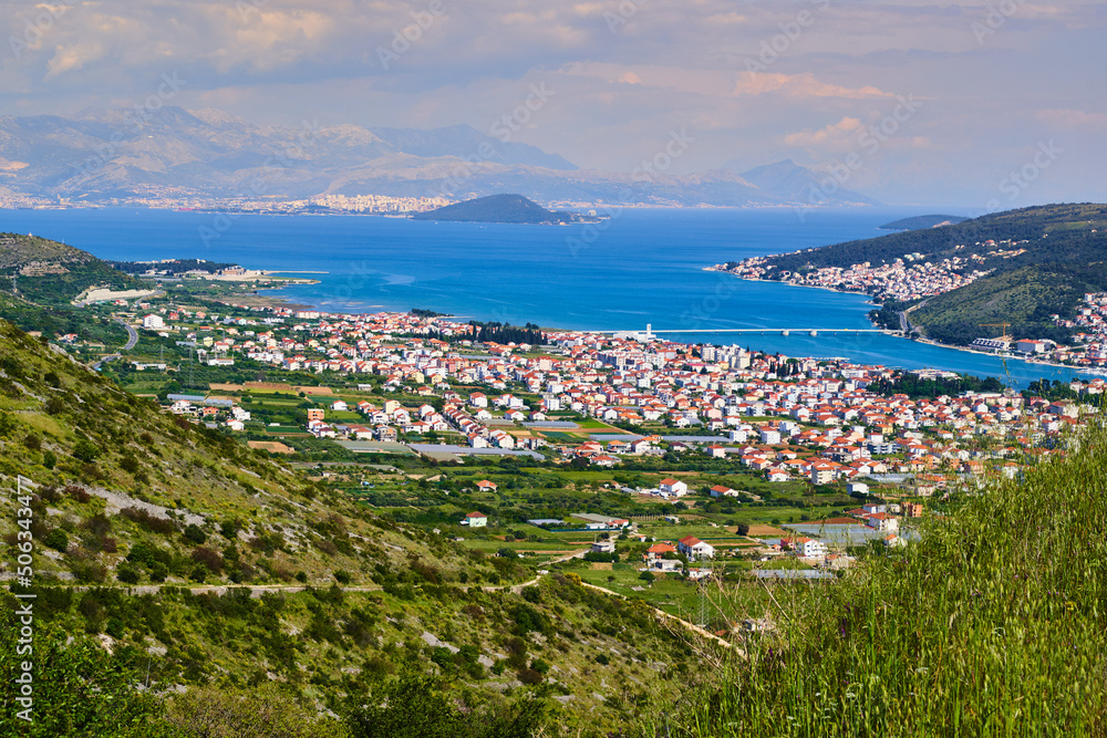Croatian small town on the Adriatic coast with a bridge to the island in the middle sea near Split