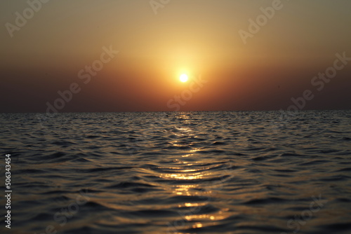 View of the sun at sunset in Qatar