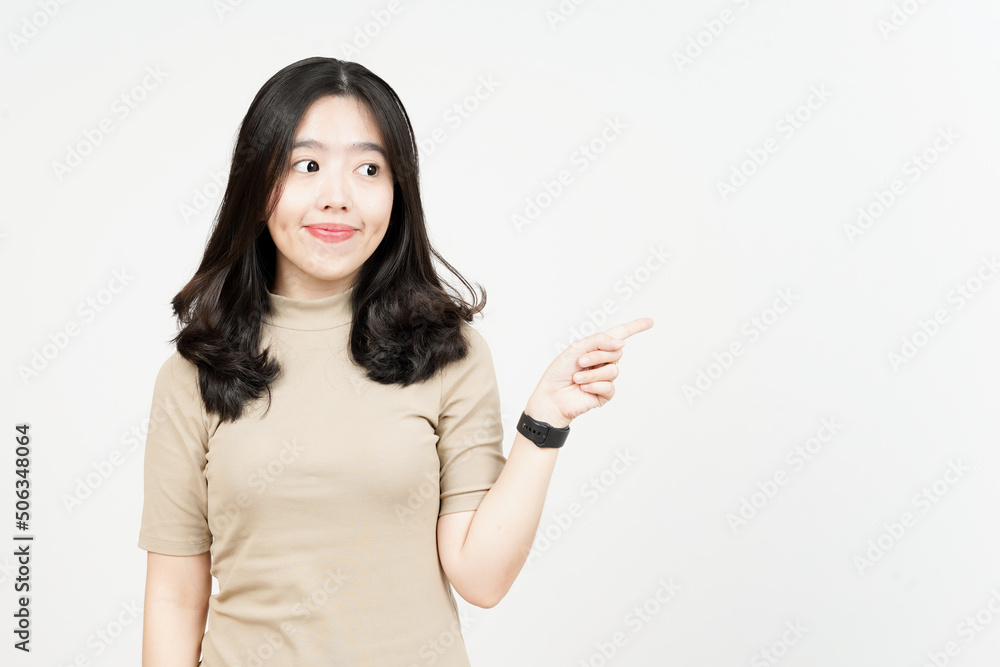Showing Product and Pointing Side Of Beautiful Asian Woman Isolated On White Background Showing Product and Pointing Side Of Beautiful Asian Woman Isolated On White Background