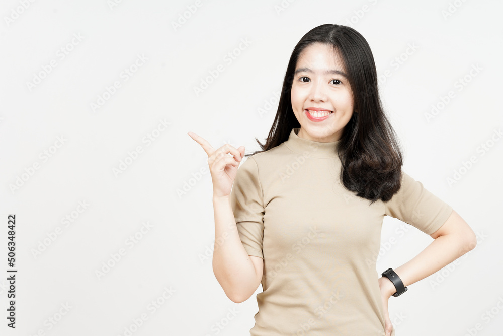 Showing Product and Pointing Side Of Beautiful Asian Woman Isolated On White Background Showing Product and Pointing Side Of Beautiful Asian Woman Isolated On White Background