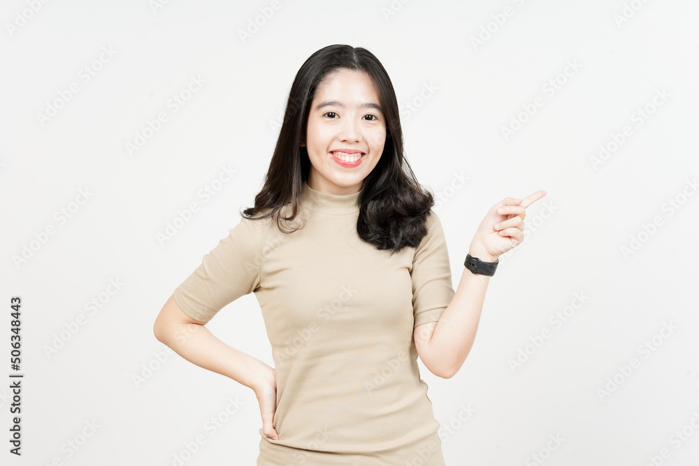 Showing Product and Pointing Side Of Beautiful Asian Woman Isolated On White Background Showing Product and Pointing Side Of Beautiful Asian Woman Isolated On White Background