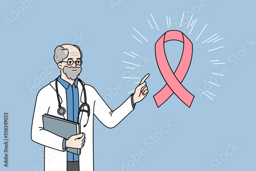 Old male doctor in white medical uniform point at pink ribbon raise awareness of oncology. Man oncologist talk about cancer and treatment. Healthcare and medicine. Vector illustration. 
