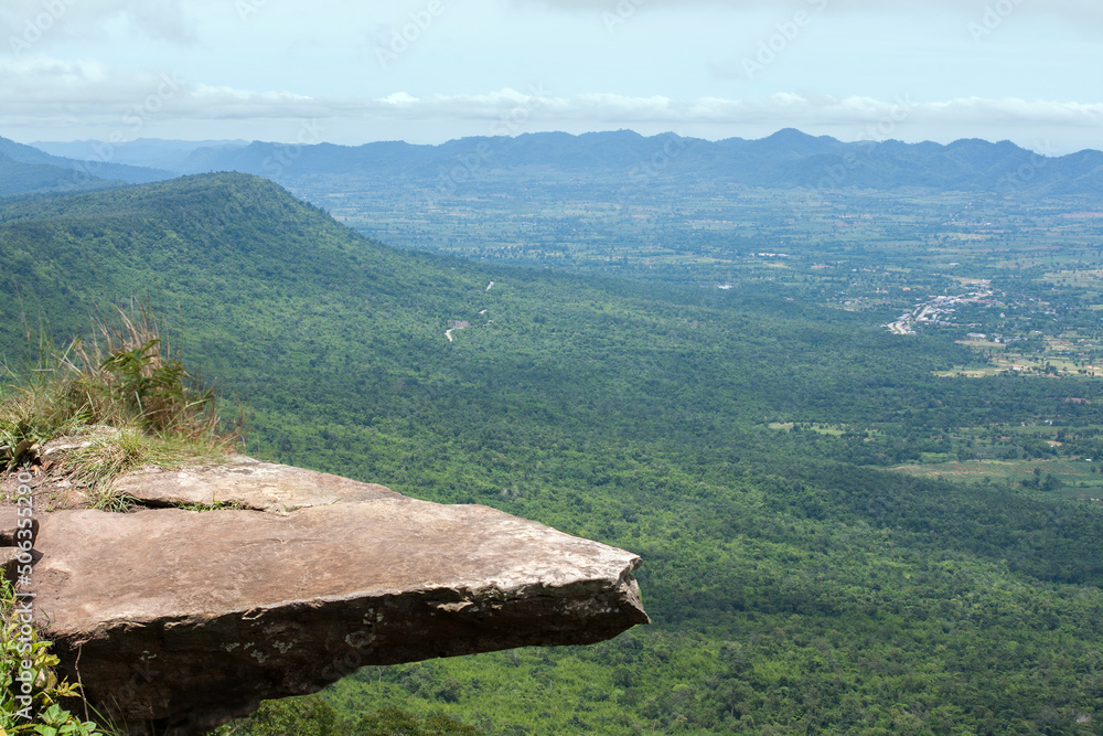 Pha Hum Hod Cliff in Chaiyaphum Province, Thailand, is a steep cliff, 700 meters deep. There is nothing to hold on when leaning out to watch the view down the cliff making it feels very soul-stirring