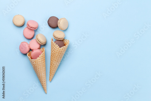 Various macaroon cookies in ice cream cones