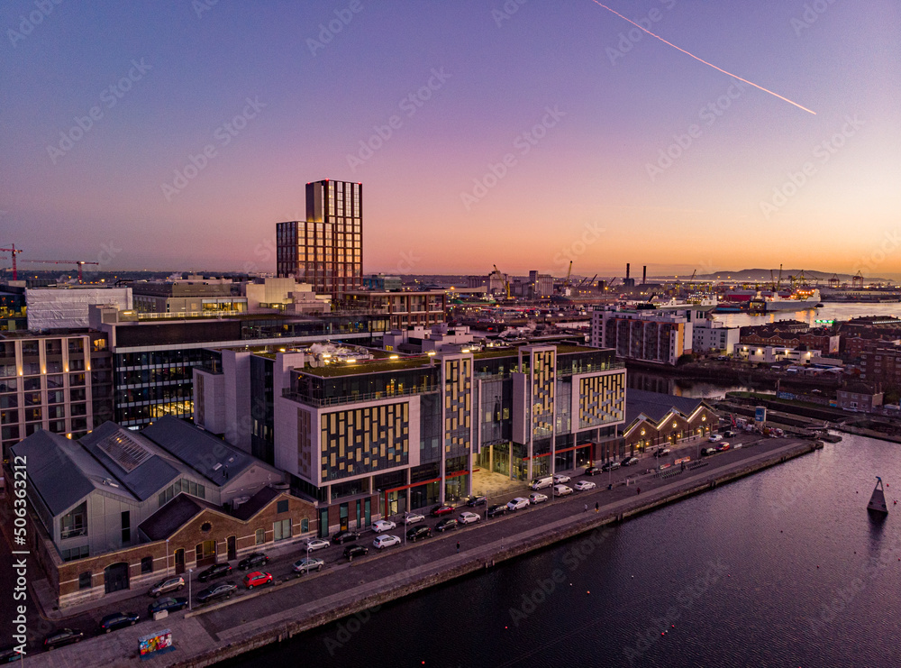 Naklejka premium Aerial photography of Grand Canal Dock, Dublin during sunset