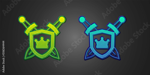 Green and blue Medieval shield with crossed swords icon isolated on black background. Vector