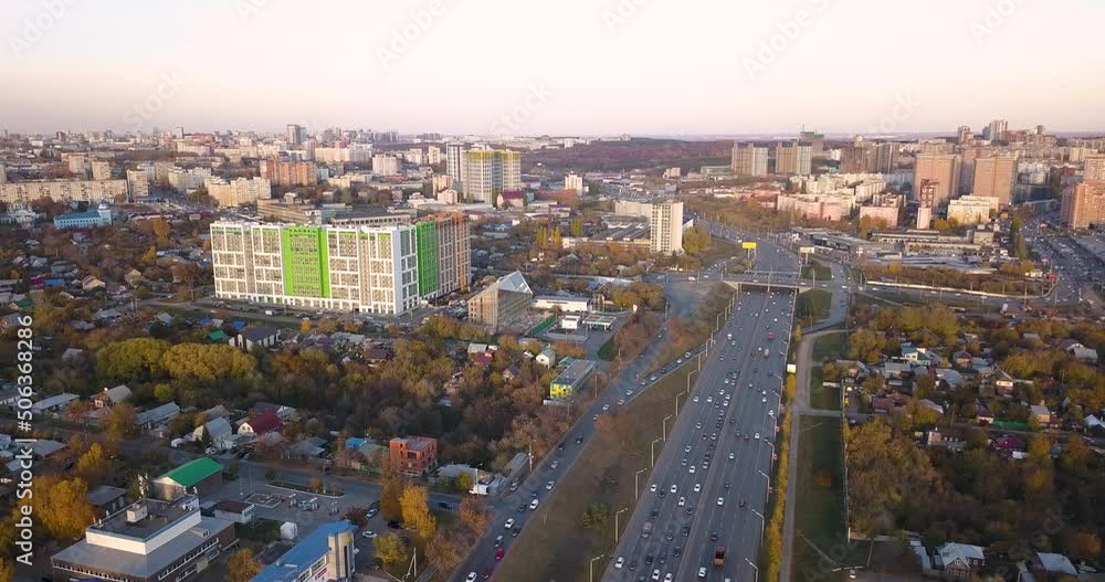 City crossroads and overpasses with traffic aerial view. Transport in the busy city concept City crossroads and overpasses with traffic aerial view. Transport in the busy city concept