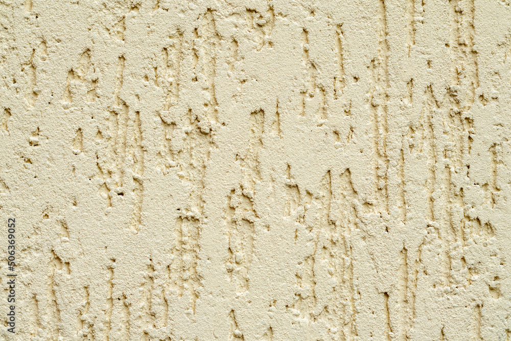Beige plastered wall texture. Seamless surface and abstract solid background. Pale painted wall built structure. Beige plastered wall texture. Seamless surface and abstract solid background. Pale painted wall built structure.