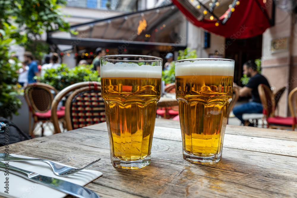 Fototapeta premium Coups of beer over restaurant table, Budapest