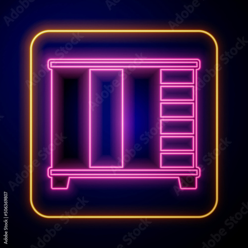 Glowing neon Wardrobe icon isolated on black background. Cupboard sign. Vector