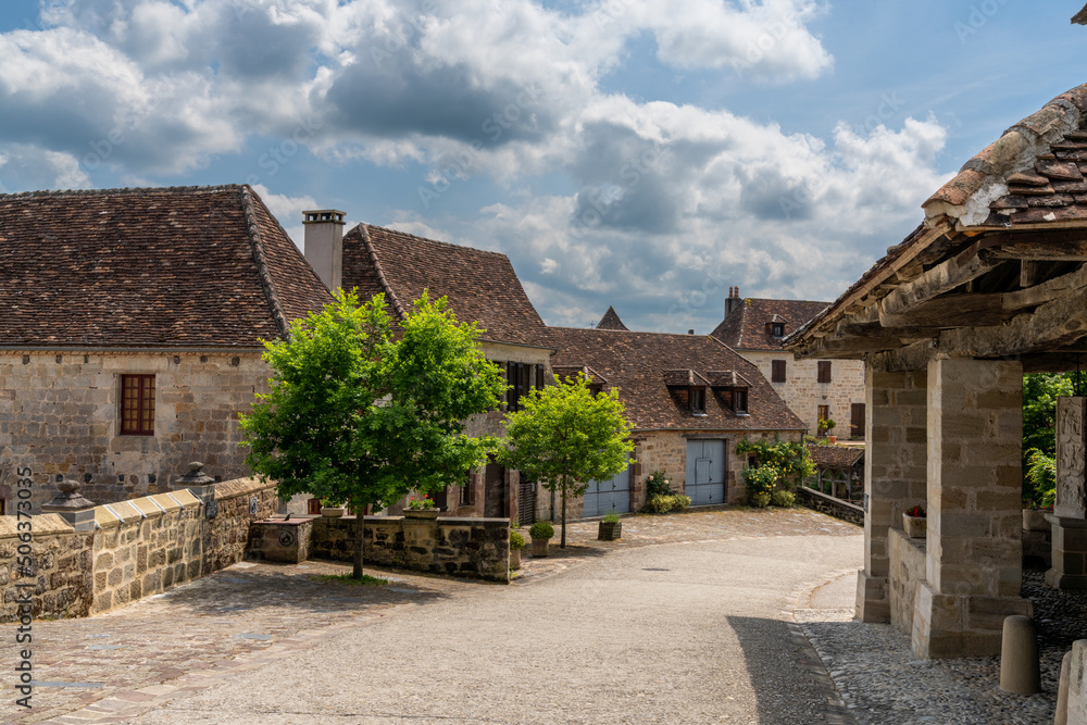 picturesque street with stone houses in an idyllic French country village