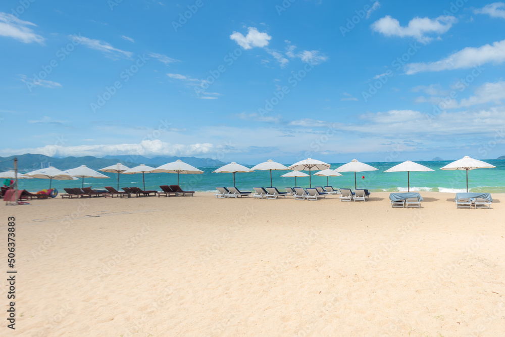 Nha Trang beach with umbrellas and chairs Nha Trang beach with umbrellas and chairs