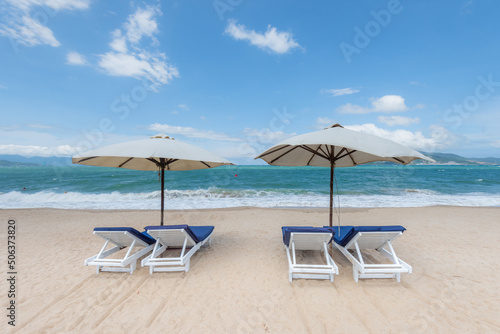 Nha Trang beach with umbrellas and chairs  © lochuynh