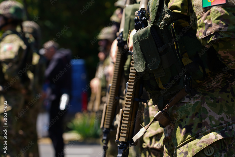 Portuguese Army uniform worn by soldiers in a military base. Flag of Portugal on the uniform. Portuguese Army uniform worn by soldiers in a military base. Flag of Portugal on the uniform.