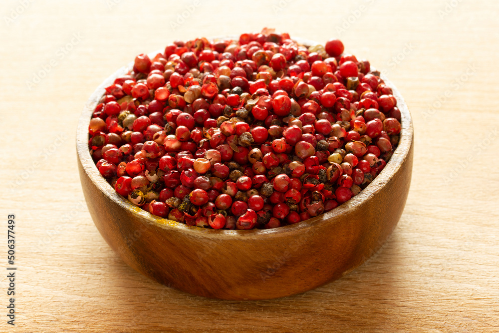 red pepper seeds in wooden plate red pepper seeds in wooden plate