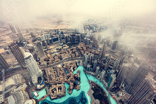 Canvas Print Dubai UAE aerial rooftop view from Burj Khalifa in clouds.