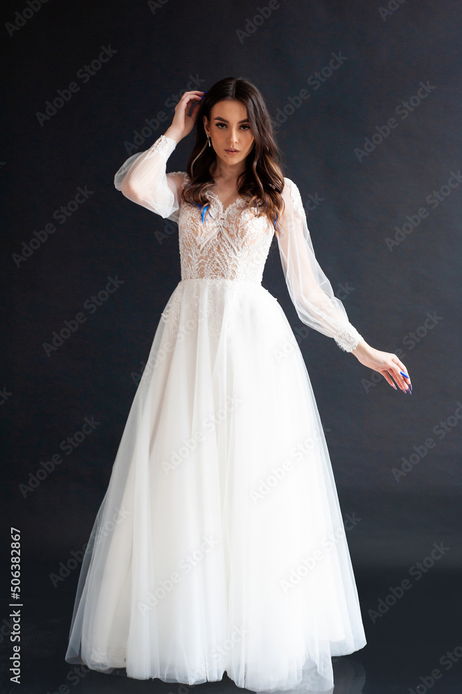 Beautiful bride perfect style. Wedding hairstyle make-up luxury wedding dress Beautiful bride perfect style. Wedding hairstyle make-up luxury wedding dress