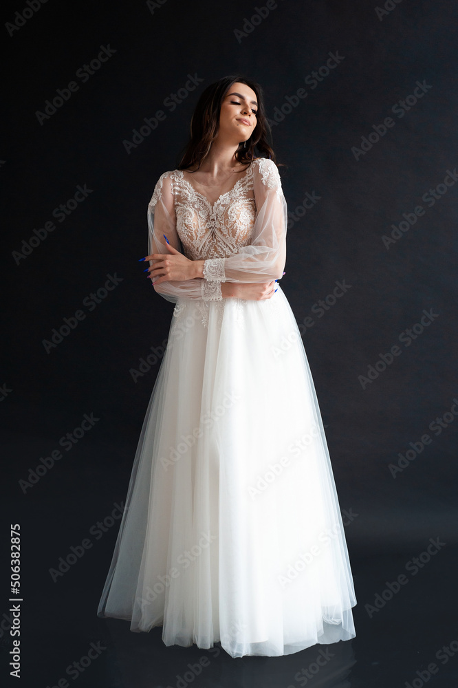 Beautiful bride perfect style. Wedding hairstyle make-up luxury wedding dress