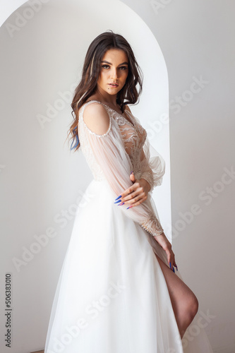 Beautiful bride perfect style. Wedding hairstyle make-up luxury wedding dress