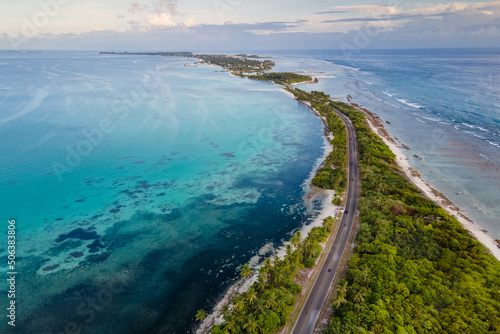 Aerial view of tropical beach landscape and local road at addu city, the southernmost atoll of Maldives in Indian ocean. Maldives tourism and summer vacation concepts photo