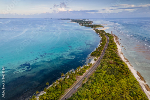 Aerial view of tropical beach landscape and local road at addu city, the southernmost atoll of Maldives in Indian ocean. Maldives tourism and summer vacation concepts photo