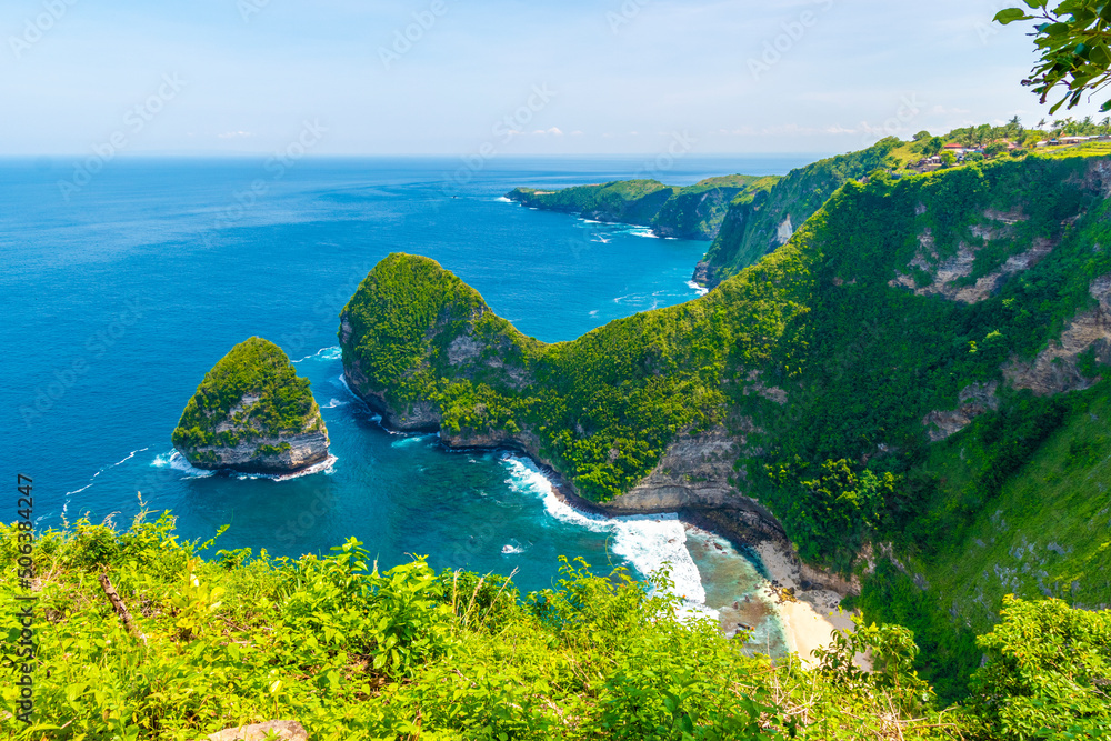 Paluang cliff above beautiful blue waters near Kelingking Beach on Nusa Penida island. Paluang cliff above beautiful blue waters near Kelingking Beach on Nusa Penida island.