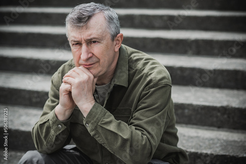 Mature European man with a sad philosophical mood. The concept of life after 50 years, problems and depression. Crisis of middle age