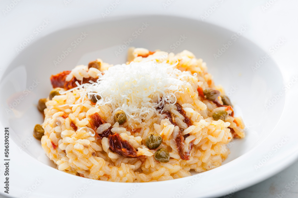 Italian risotto with dry tomatoes and capers Italian risotto with dry tomatoes and capers