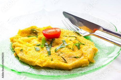 egg omelette with spring onion and tomato photo