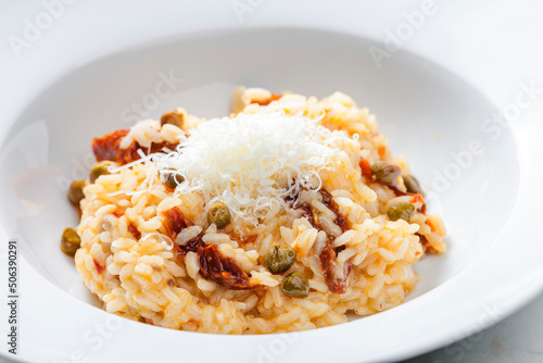 Italian risotto with dry tomatoes and capers