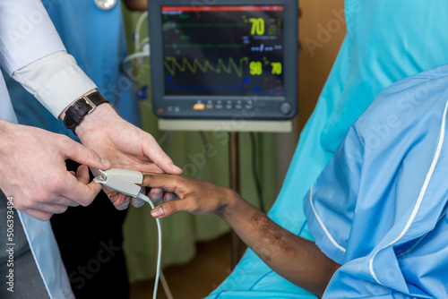 Patient checking oxygenation with fingertip pulse oximeter. Saturation blood of oxygen. Measure pulse rate and oxygen