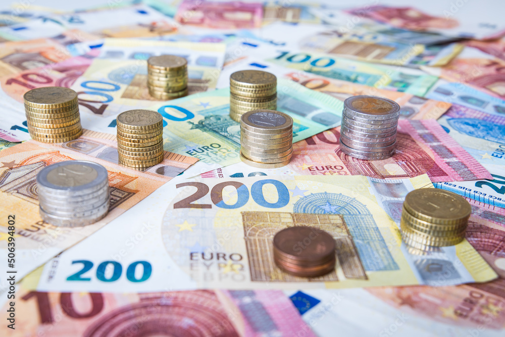 A combination of different Euro banknotes and Euro coins A combination of different Euro banknotes and Euro coins