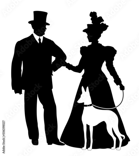 Silhouette of elegant couple in victorian dress with Ibizan Hound dog. Young man and woman in historical clothing with dog. 