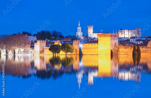 Palace of the Popes or Palais des Papes and Avignon Cathedral panoramic view at dusk - Avignon city, France
