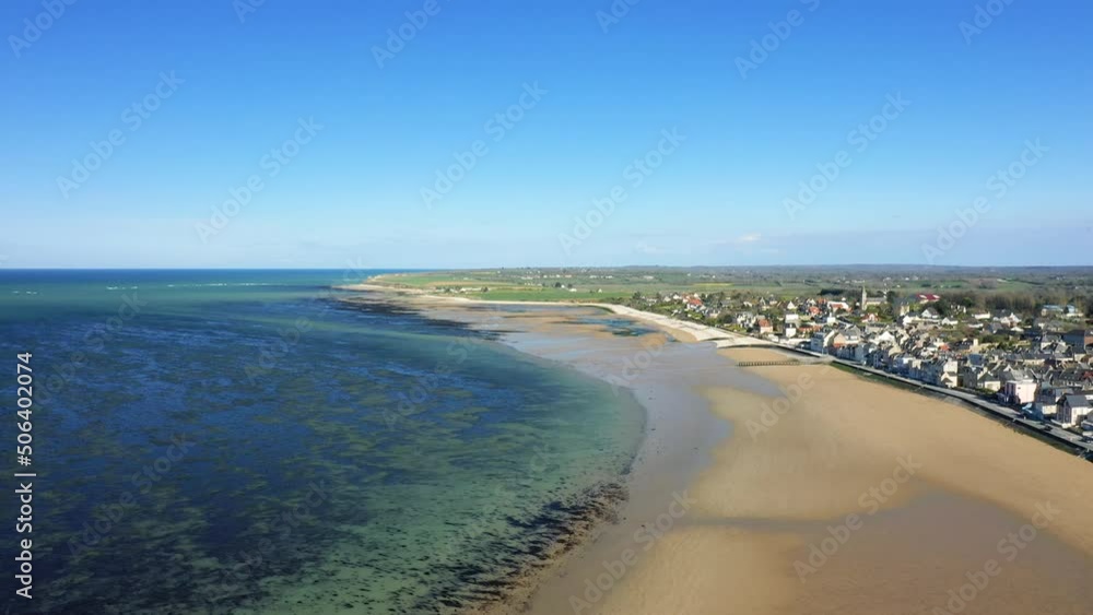 The town of Grandcamp Maisy at the edge of the Channel Sea in Europe, France, Normandy, towards Omaha beach, in spring, on a sunny day. The town of Grandcamp Maisy at the edge of the Channel Sea in Europe, France, Normandy, towards Omaha beach, in spring, on a sunny day.