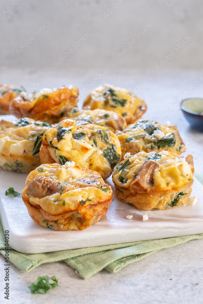 Vegetarian egg muffins with mushroom, green kale and feta cheese for Healthy keto diet Breakfast or lunch