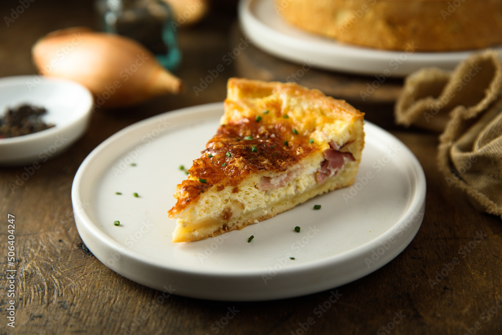 Traditional homemade French quiche with onion and bacon Traditional homemade French quiche with onion and bacon