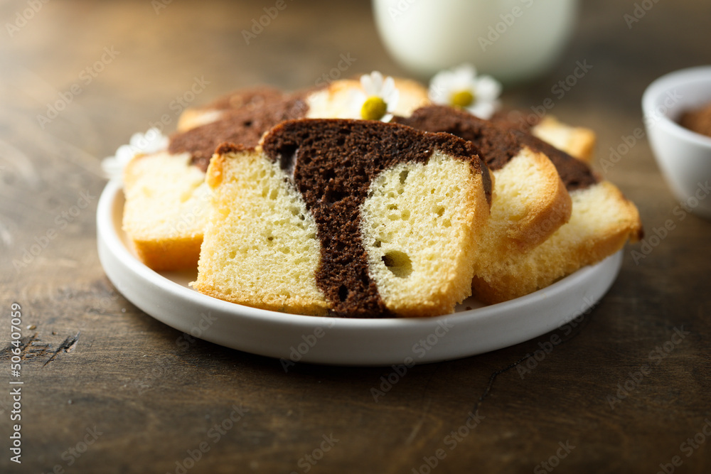 Homemade vanilla chocolate marbled cake on a plate Homemade vanilla chocolate marbled cake on a plate