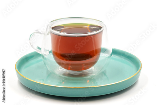 Black tea on a white background. Turkish tea brewed with hot water. close up