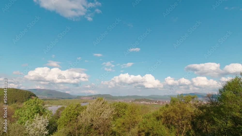 Mountains trees and blue sky tilt up camera movement Mountains trees and blue sky tilt up camera movement