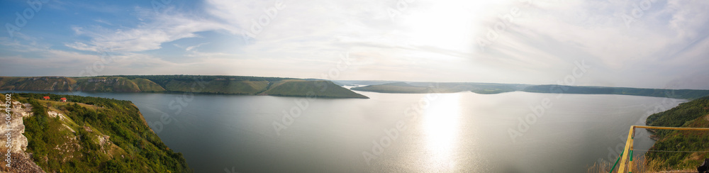 Beautiful landscape over the river on background of magnificent sky, panorama of Bakota bay, nature in Ukraine