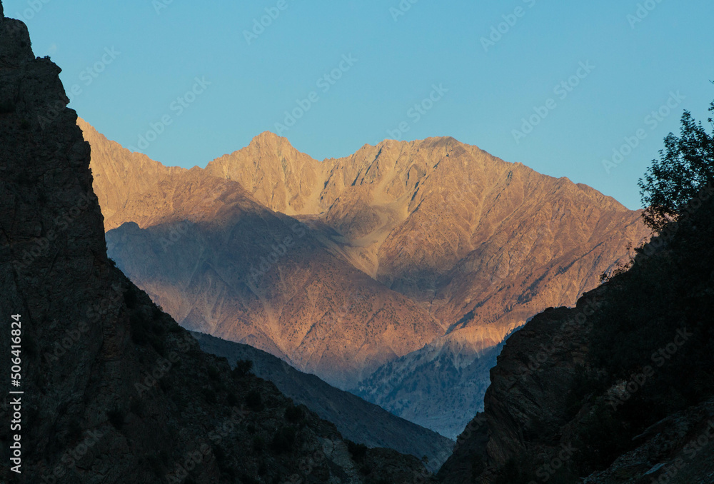 Mountain landscapes of Chitral at sunset, KP, Pakistan. Pink mountains of Hindukush