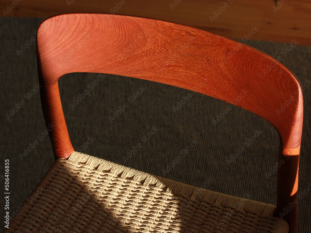 A danish mid century modern teak chair from the 60s vintage standing in the dining living room