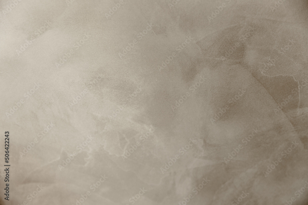 Naklejka premium Background beige textured. Abstract, waves, plaster, wallpaper