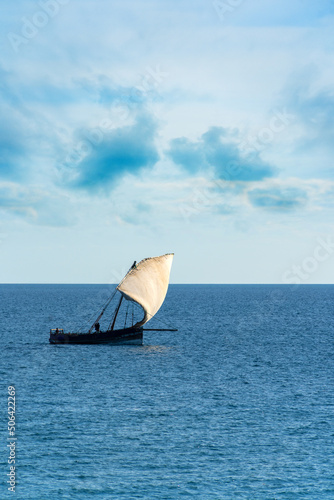 traditional sailing dhow with powerful sail