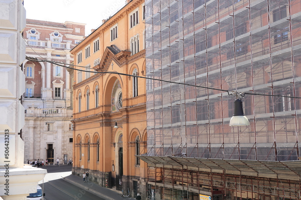 Obraz premium Rome Street View with Waldensian Church Facade and Building Exterior with Scaffolding, Italy